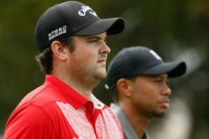 Woods warns Reed of Australian crowds after penalty controversy