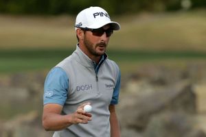 Landry holds off fast-finishing Ancer to win The American Express