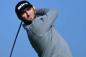Rahm leads at Torrey Pines, Tiger five shots back
