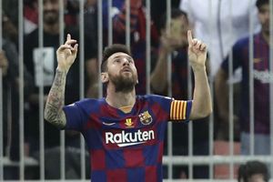 Messi takes Barcelona back to the top of La Liga