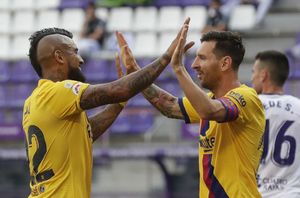 Vidal scores as Barcelona beat Valladolid to stay alive in La Liga title hunt
