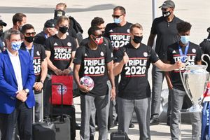 Bayern Munich in subdued return with Champions League trophy