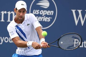 Djokovic cruises through as defending champion Medvedev exits