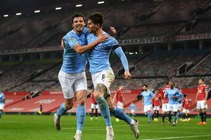 Manchester United 0-2 Manchester City: Stones ends goal drought as holders reach another final