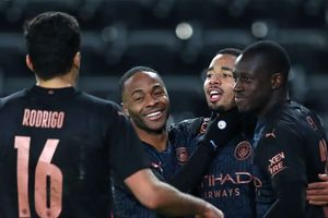Swansea City 1-3 Manchester City: Record-breaking Premier League leaders reach last eight