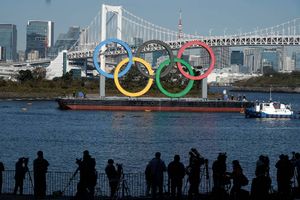 Tokyo Olympic torch relay: Masks, quiet cheering and caution
