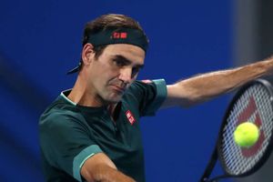 Federer marks return by winning mini-epic with friend Evans in Doha