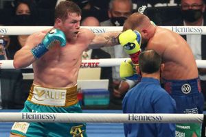 Canelo unifies titles after Saunders' corner waves off fight in front of record crowd