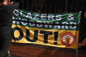Manchester United fans protest on Old Trafford pitch before Liverpool game