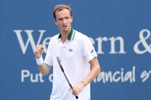 Red-hot Medvedev through to QFs, Tsitsipas survives