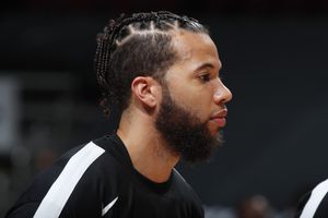 Former Rookie of the Year Carter-Williams to miss start of NBA season