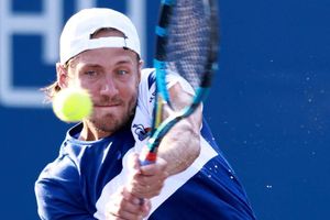 From brink of qualifying exit to second round, Pouille powers on at Winston-Salem