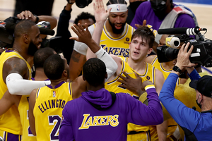 NBA: Lakers beat Mavs in overtime for third straight win, Holiday lifts depleted Bucks