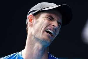 Murray suffers early-season blow but Nadal roars back with doubles win
