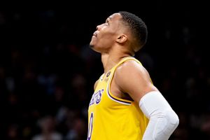 Depleted Lakers lose again, Paul and Booker star for red-hot Suns
