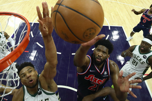 Late Giannis block guides Bucks past 76ers, George leads Clippers comeback on return