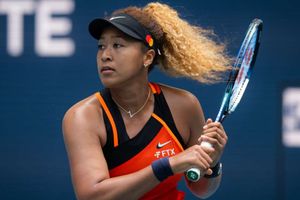 Osaka through in walkover, Collins battles in Miami