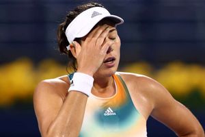 Muguruza eliminated at Eastbourne, Halep and seeds ease through in Germany