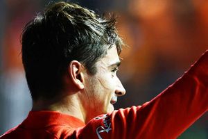 Leclerc takes pole in Singapore as Verstappen struggles in wet conditions
