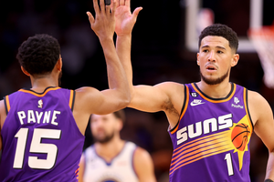 Booker stars again as Suns pile on points against Warriors, short-handed Pels down Doncic's Mavs