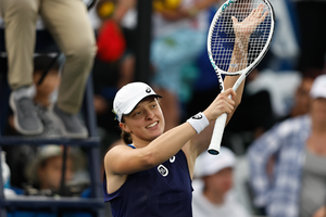 Swiatek rallies from behind to reach ninth WTA final of season