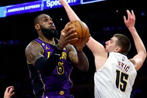 Lakers rally the troops to beat the Nuggets but face anxious wait after Davis injury