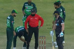 Umpire Aleem Dar throws sweater in frustration after stray throw from Mohammed Wasim Jr hits his leg