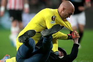 UEFA investigates after banned PSV fan attacked Sevilla goalkeeper Dmitrovic