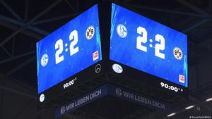 Bundesliga: Borussia Dortmund's title hopes dented in 'wild' Revierderby
