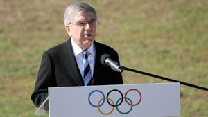 IOC backs return of Russian individual athletes under neutral flag; Teams remain barred
