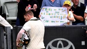 AUS vs PAK: David Warner bids adieu to the MCG, gifts his gloves to young fan in a noble gesture