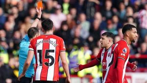 Sheffield United condemn racist abuse sent to Mason Holgate after red card