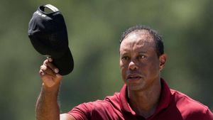 Tiger Woods welcomes son's advice before battling to 77 in 100th Masters round