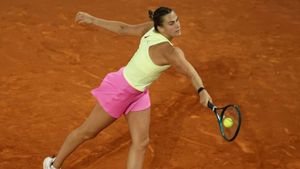 Sabalenka goes the distance again to progress at Madrid Open