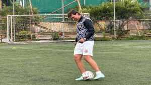 East Bengal coach Carles Cuadrat shows his football skills during training in Shillong ahead of Durand Cup 2024 Quarterfinal