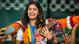 Manu Bhaker Arrives Home to Grand Reception After History-Making Feat at Paris Olympics 2024