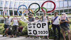 International Paralympic Committee drops its controversial rule banning athletes from displaying Olympic ring tattoos