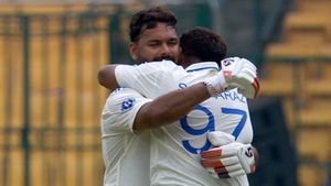 Rishabh Pant gives a bear hug to centurion Sarfaraz Khan moments after horrible mix-up, animated chat