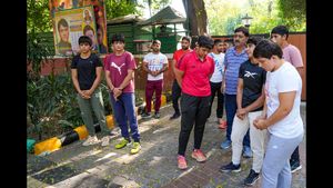 Wrestlers Urge Sports Minister Mandaviya for Assistance After World Championships Withdrawal