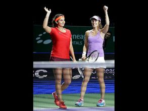 డబ్ల్యూటీఏ ఫైనల్స్ విజేతగా సానియా జోడి(ఫోటోలు)