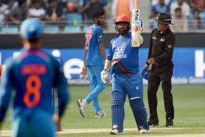 భారత్‌తో మ్యాచ్: ఫోర్‌తో సెంచరీ చేసిన ఓపెనర్ షెహజాద్