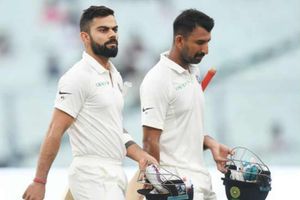 సిడ్నీ వేదికగా కోహ్లీకి సమంగా నిలిచిన పూజారా