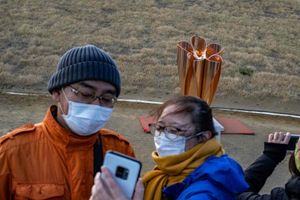 జపాన్‌లో వెలిగిన జ్యోతి.. తూతూ మంత్రంగా స్వాగత కార్యక్రమం!!