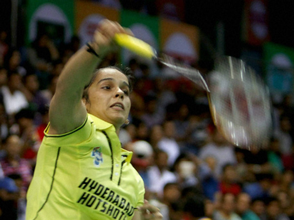 Saina overcomes Sindhu challenge