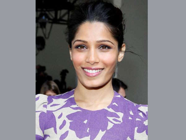 Actress Freida Pinto attends the Michael Kors 2014 Fall/Winter Collection