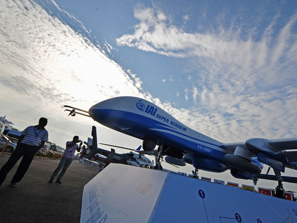 Trade visitors view the Israeli UAV during the Singapore Airshow