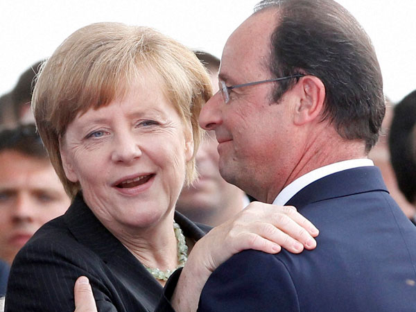 Friendly hug to Hollande