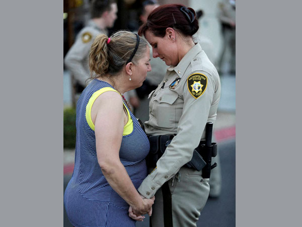 Well wishers pray for deceased policemen