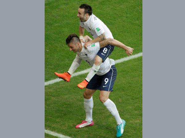 France's Mathieu Valbuena, right, celebrates