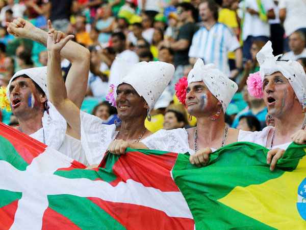 French supporters react before the group E World Cup soccer 